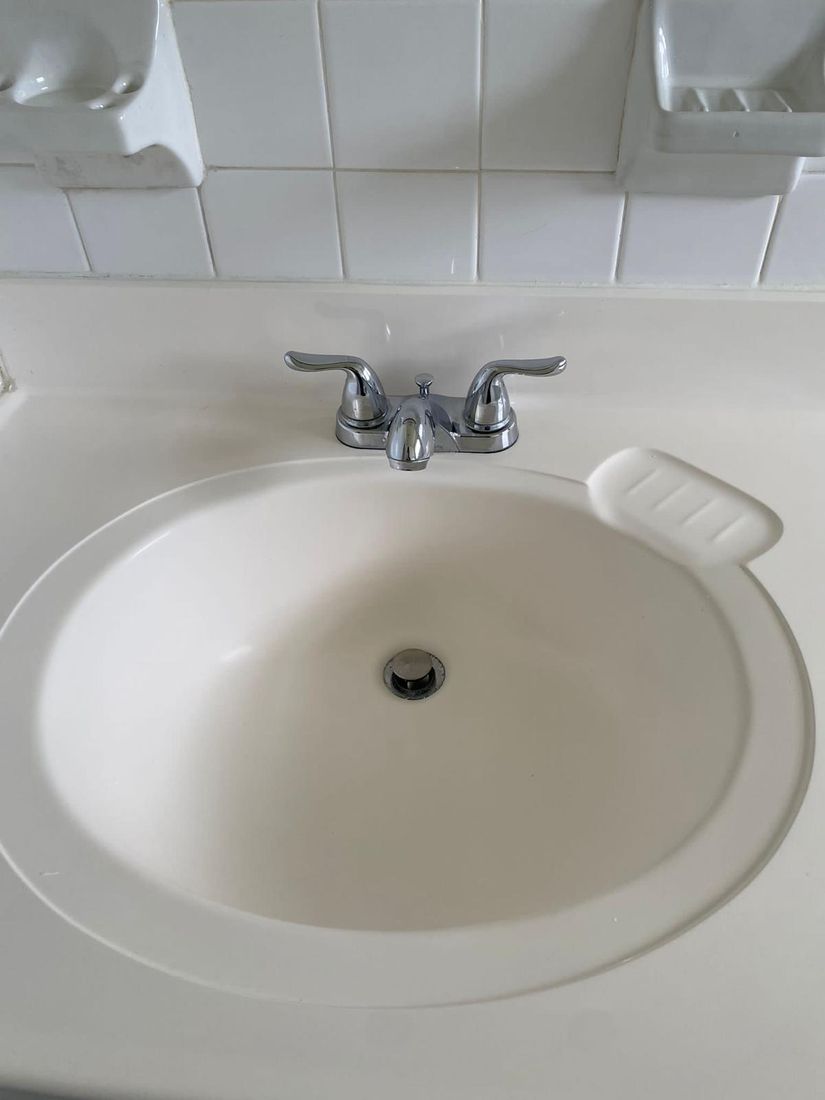 Clean, shining bathroom sink after cleaning